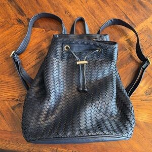 Navy faux leather back pack